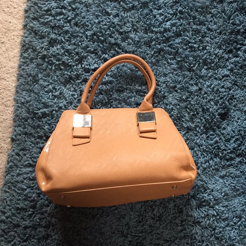 Ivanka Trump handbag. Slight wear. 9” by 12”.